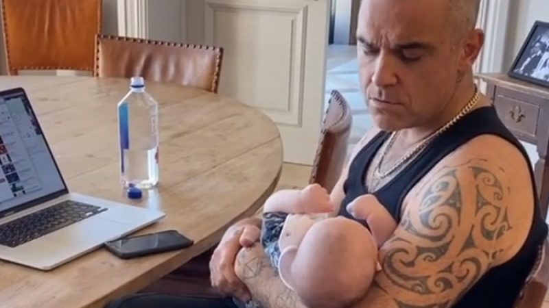 Robbie Williams sings Glen Campbell song to get baby boy to sleep in cute video
