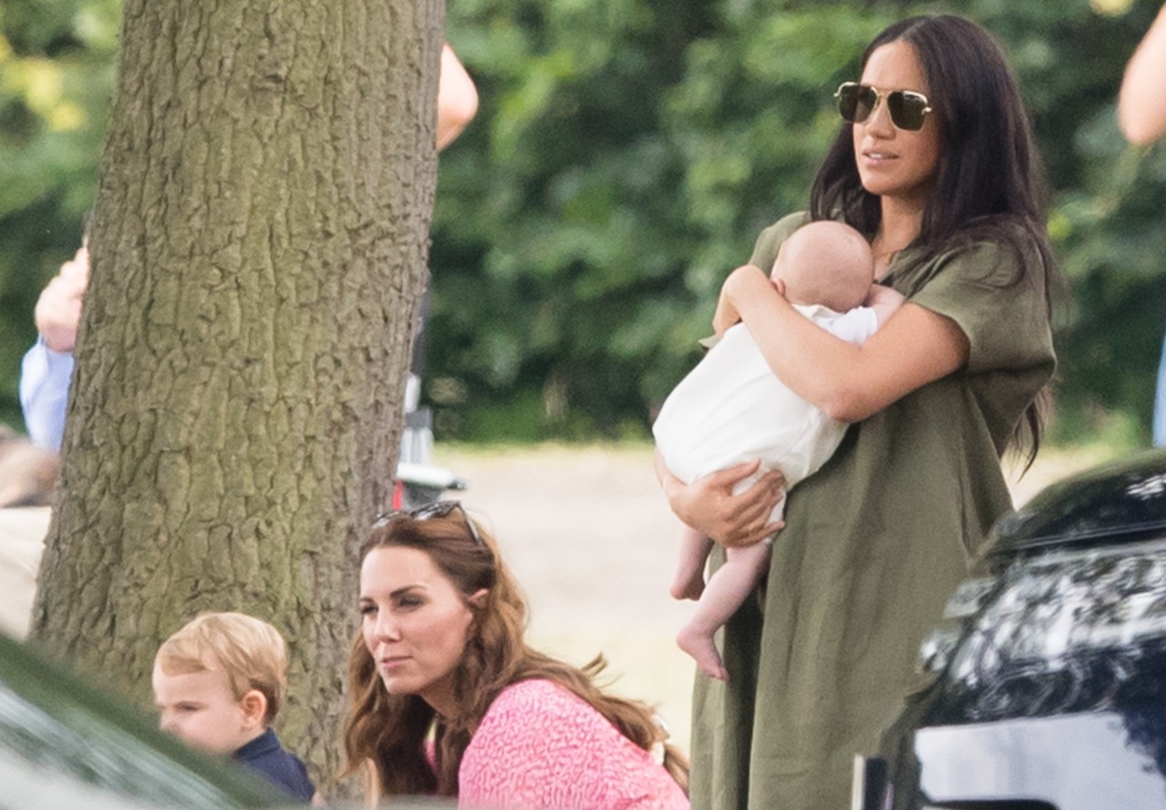 WOKINGHAM, ENGLAND - JULY 10: Meghan, Duchess of Sussex and Archie Harrison Mountbatten-Windsor, Catherine, Duchess of Cambridge and Prince Louis attend The King Power Royal Charity Polo Day at Billingbear Polo Club on July 10, 2019 in Wokingham, England. (Photo by Samir Hussein/WireImage)