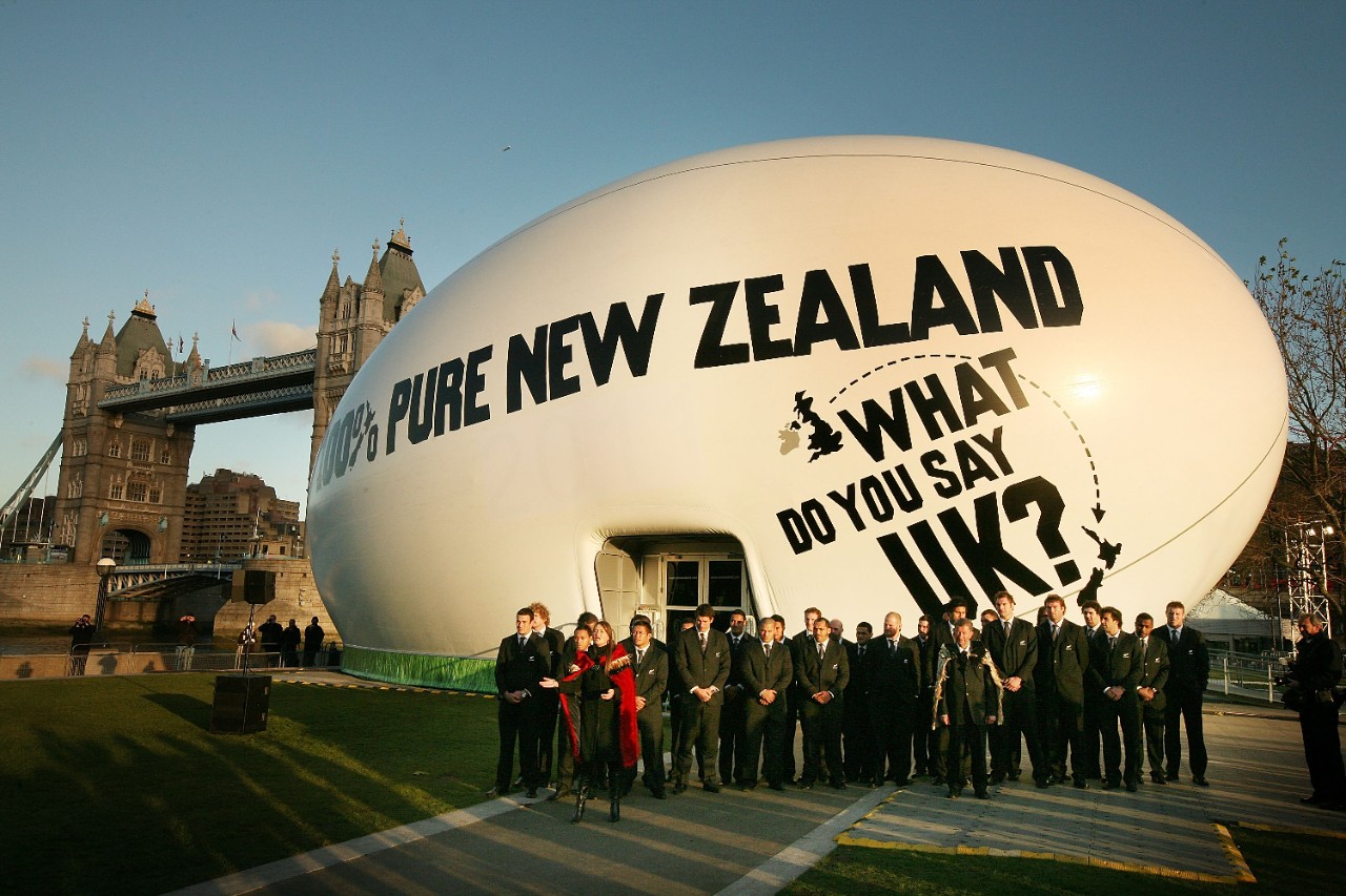 LONDON - NOVEMBER 25:  Members of the New Zealand All Blacks rugby team wait to greet Queen Elizabeth II on November 25, 2008 in London. The Queen visited a New Zealand tourism exhibition housed in a giant inflatable rugby ball near London's Tower Bridge.  (Photo by Peter Macdiarmid/Getty Images)